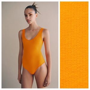 NWT. Zara Orange Limitless Contour Seamless Bodysuit. Size XS-S.